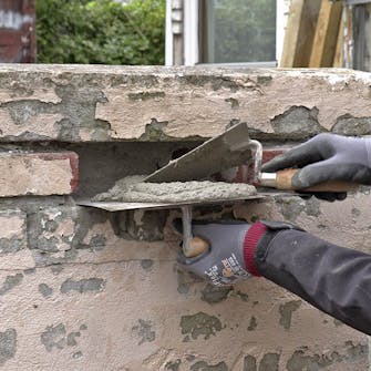 Udskiftning af mursten: Kom mørtlen ind i hullet Udskiftning af mursten: Kom mørtlen ind i hullet